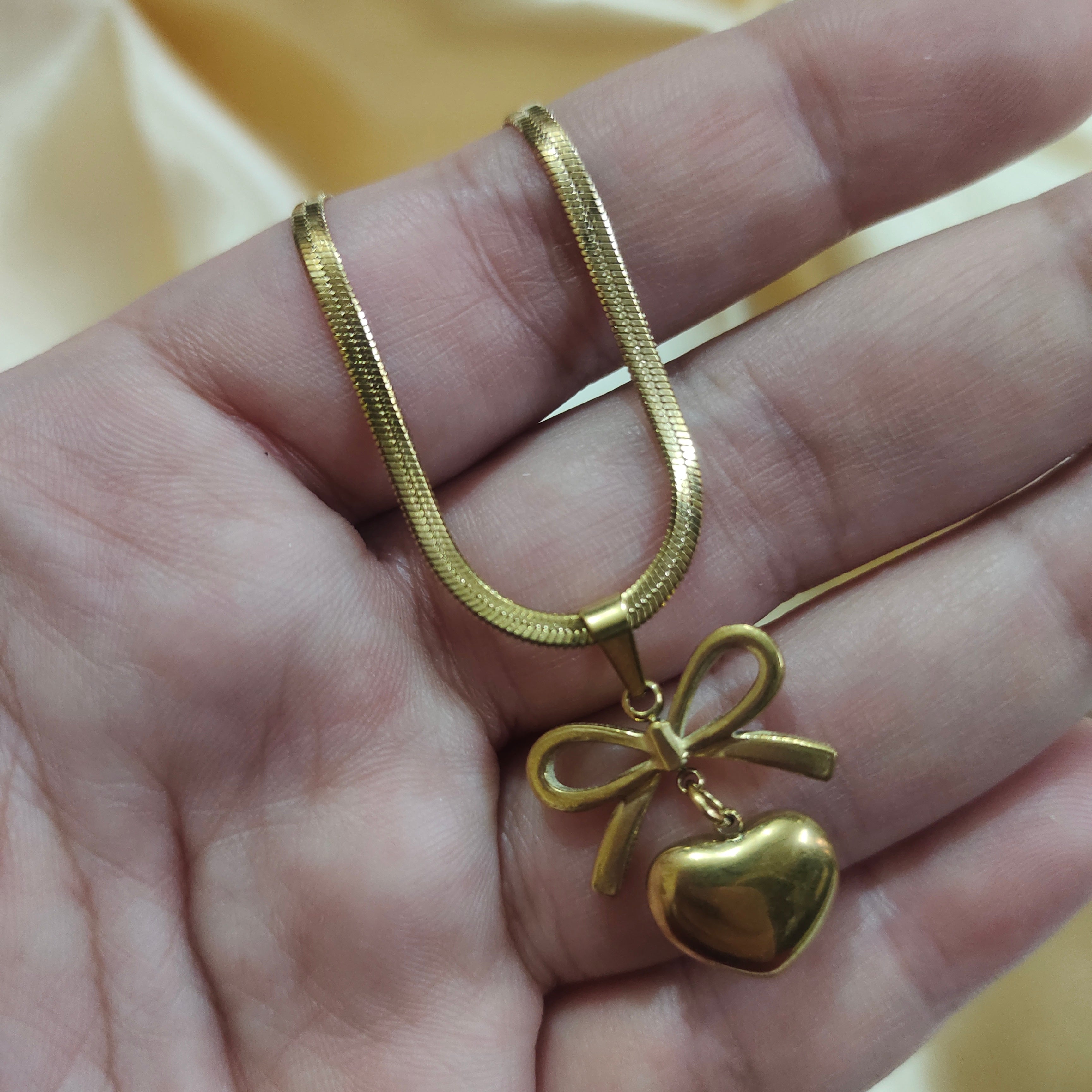 Golden Heart Bow Pendant